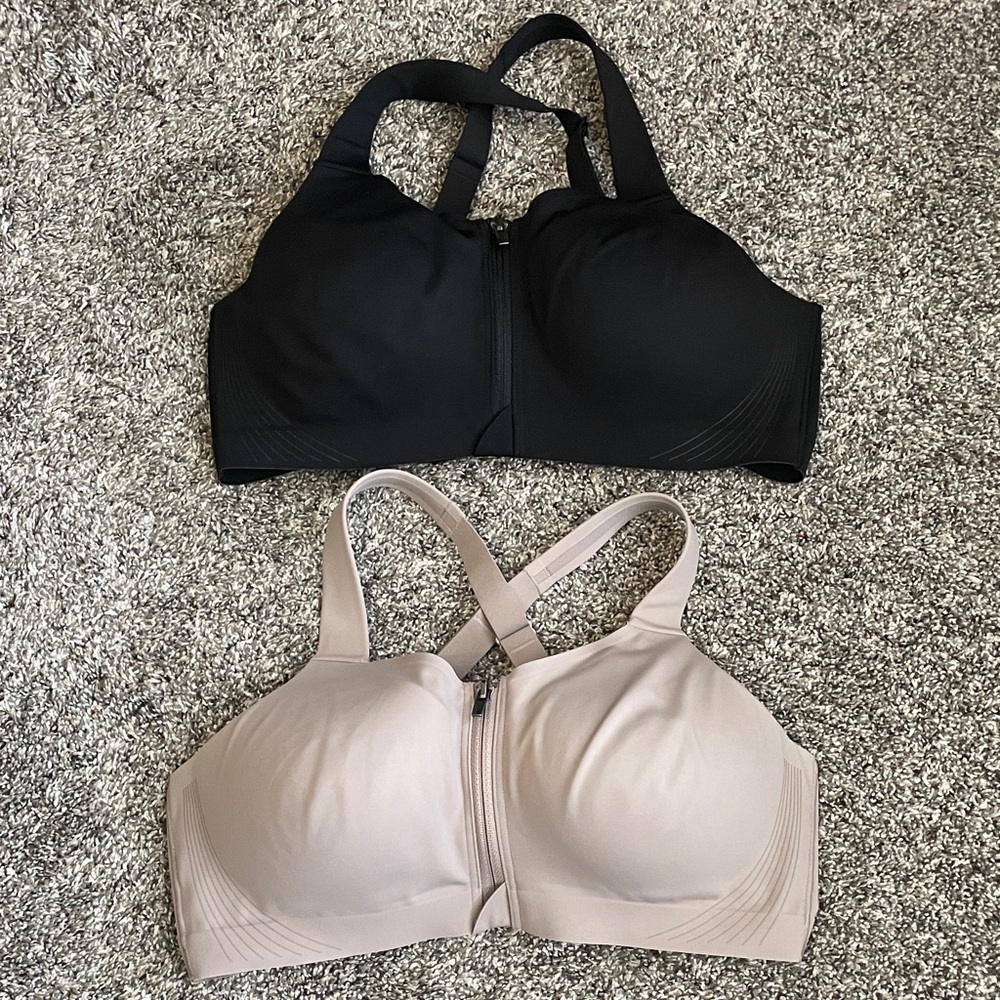 2 Victoria’s Secret bras size 36D front closure with zipper. Underwire.